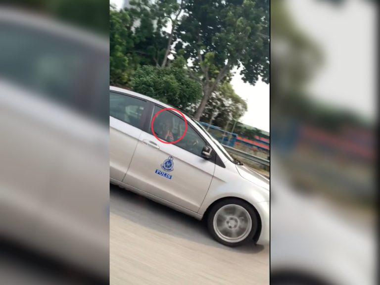 Anggota polis disaman selepas aksi guna telefon sambil memandu tular