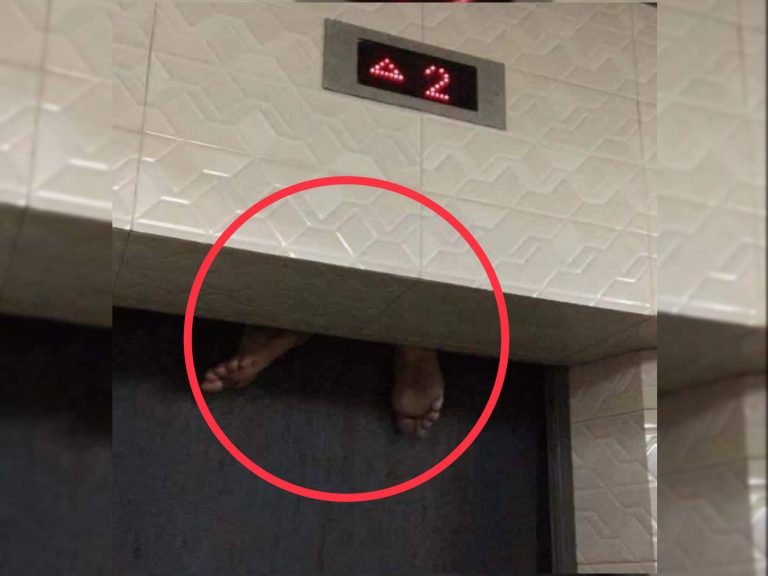 Kaki lelaki terjuntai tersepit lif